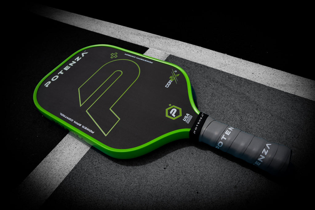 P+ PowerSpin Carbon COREx3 (Neon Green, Elongated Face) – pickleball paddle side view