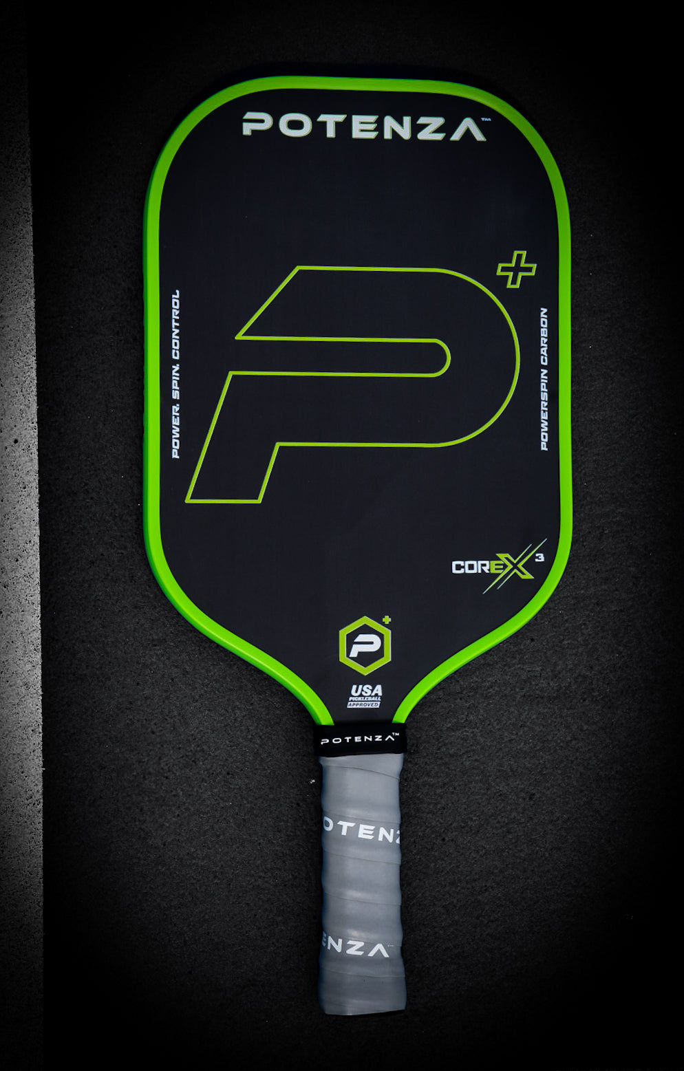 P+ PowerSpin Carbon COREx3 (Neon Green, Elongated Face) – pickleball paddle in use