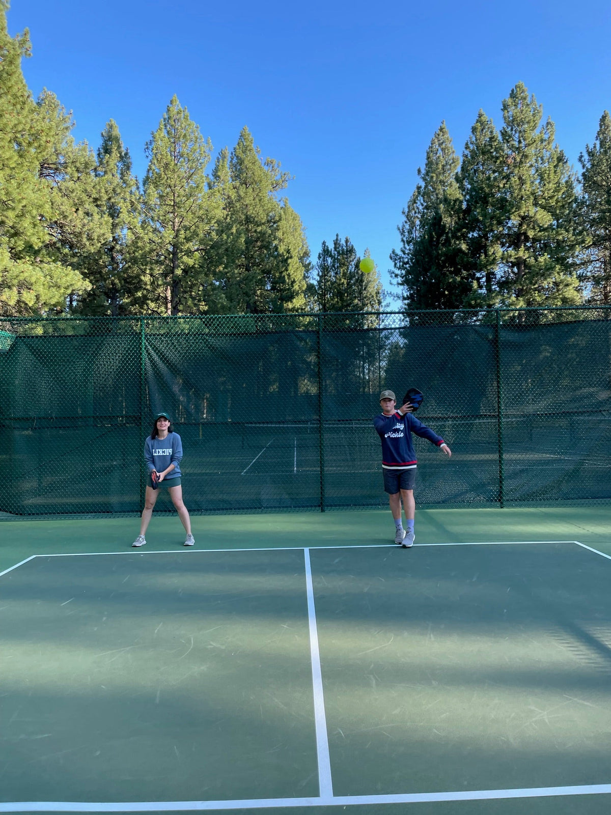 The Oversized Vintage Varsity Pickleball Sweatshirt (Unisex) in use